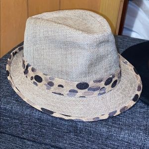 Tan hat with polka dot band